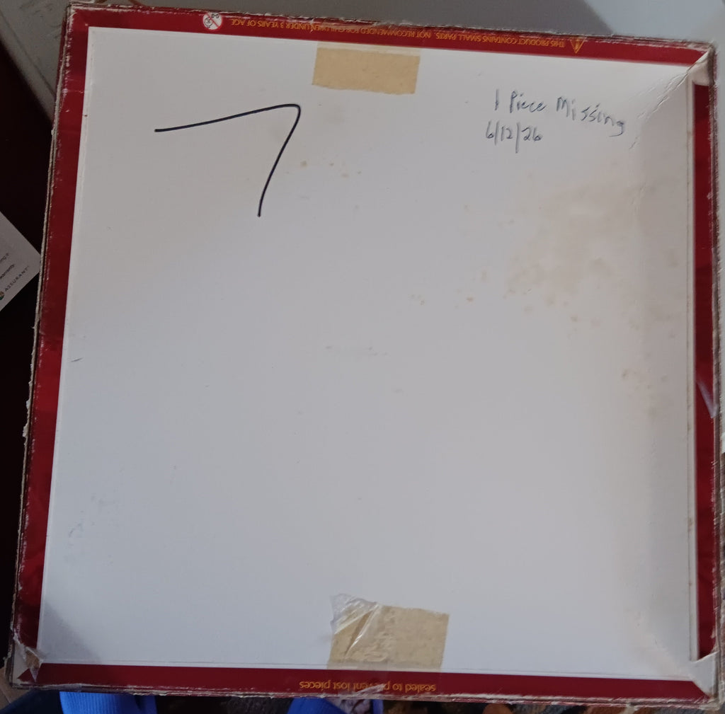 Bottom of box for puzzle Pursuits of the Past by Jane Wooster Scott.