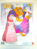 A Beauty and the Beast jigsaw puzzle package featuring the illustrated characters on the front, with puzzle piece outlines visible and a red Mattel logo at the bottom right.