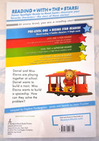 Back cover of a children's book titled 'Reading with the Star Stars!' by Simon Spotlight, showing colorful level bands, a teddy bear driving a red trolley train illustration, and a barcode.