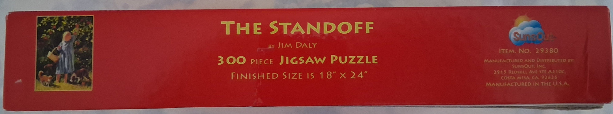 A red jigsaw puzzle box for 'The Standoff' by Jim Daly, featuring a small illustration of a man and woman in a field on the left and product details on the right.