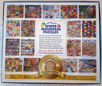 The back cover of a White Mountain Puzzles jigsaw puzzle box, featuring a grid of colorful sample puzzle images, product description text, and a gold 'Happiness Guarantee' seal.