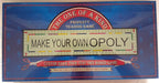 The front of a board game box for 'The One of a Kind Property Trading Game: Make Your Own Opoly'. The packaging features a blue background with a red border, a central beige game board graphic, and red banners with white text.