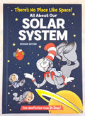 Children's book titled "There's No Place Like Space! All About Our Solar System Revised Edition" featuring Dr. Seuss-style space illustrations on a dark blue cover.