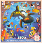 Célico 550-piece jigsaw puzzle box titled 'Sous-Marine - Undersea' featuring a colorful underwater scene with sea turtles, clownfish, tropical fish, and bubbles on a blue background.

Details